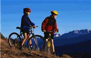 Put bike on back of Shuttle to Flattop and ride it mostly downhill back into city